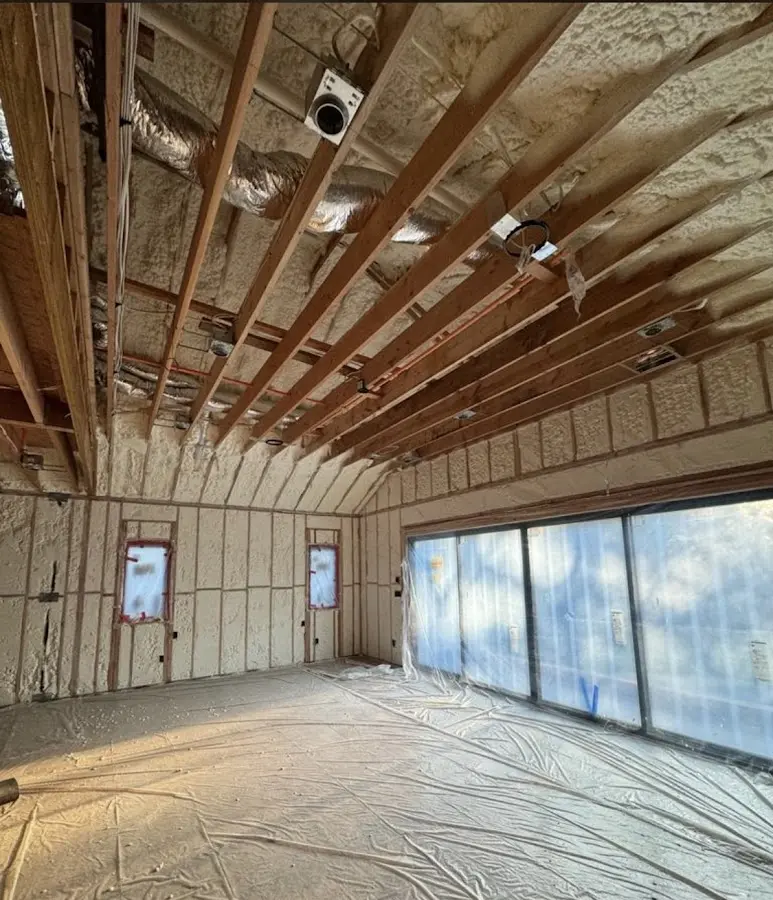 Interior walls and ceiling insulated with spray foam during new construction in Glen Rock